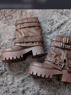 Darker wavs fold over boots